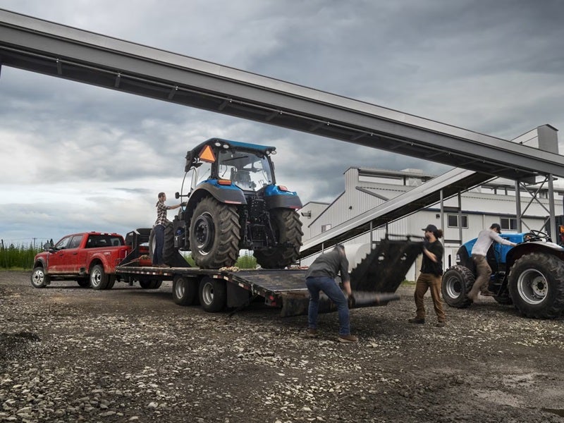 Ford F-250 Towing machinery at a work site